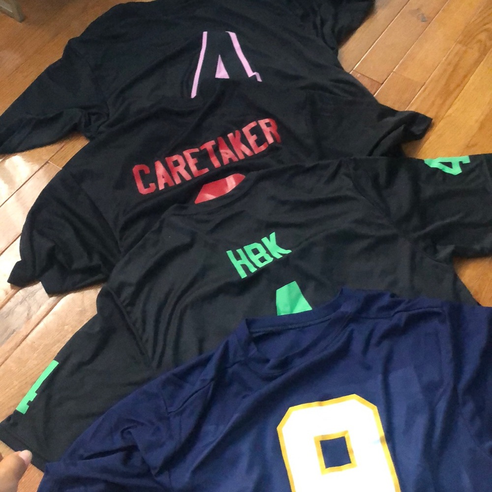 Lot of 4 athletic shirts/jerseys